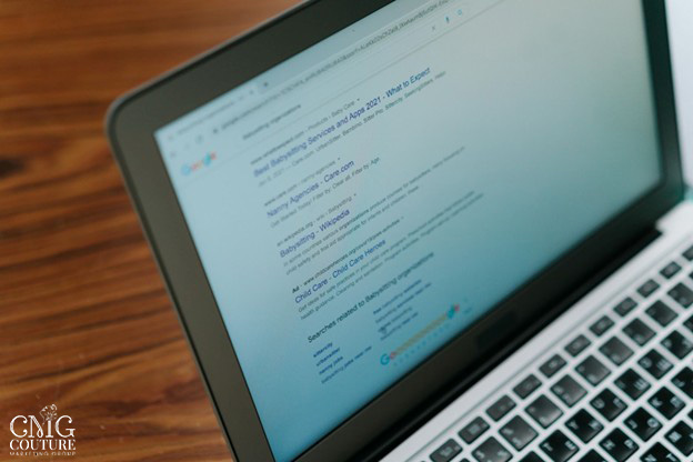 Laptop screen showing Google search results