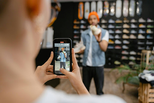 Local business creating short-form vertical video content for Facebook and Instagram ads